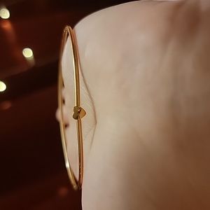 Gold heart bangle